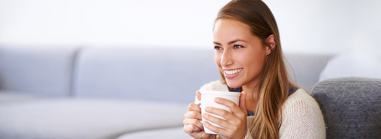 Shot of a young woman having coffee at homehttp://195.154.178.81/DATA/i_collage/pi/shoots/805668.jpg